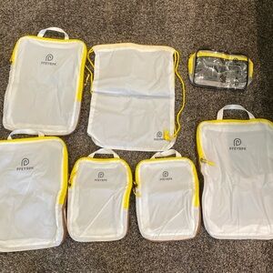 New in box Pfeyrpk compression packing cubes set of seven